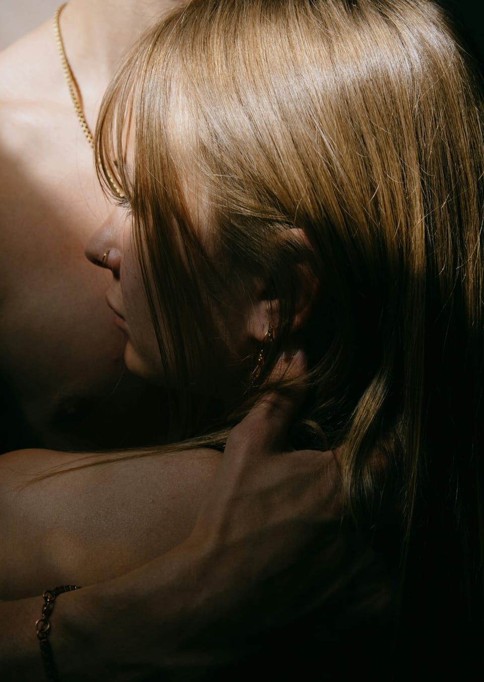 emotional nudity and vulnerability between a couple in intimate portrait
